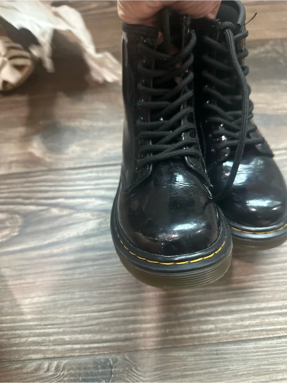 Dr. Martens Kids Black Patent Lace-Up Combat Boots with Yellow Heel Loop